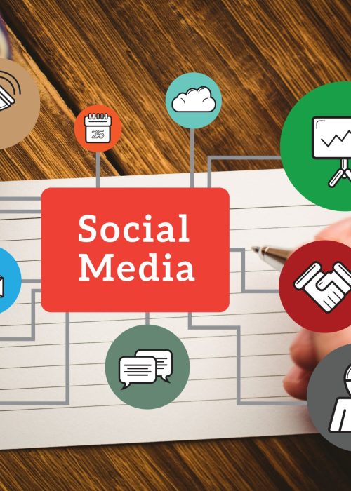 digital composite of hands using notebook with graphics